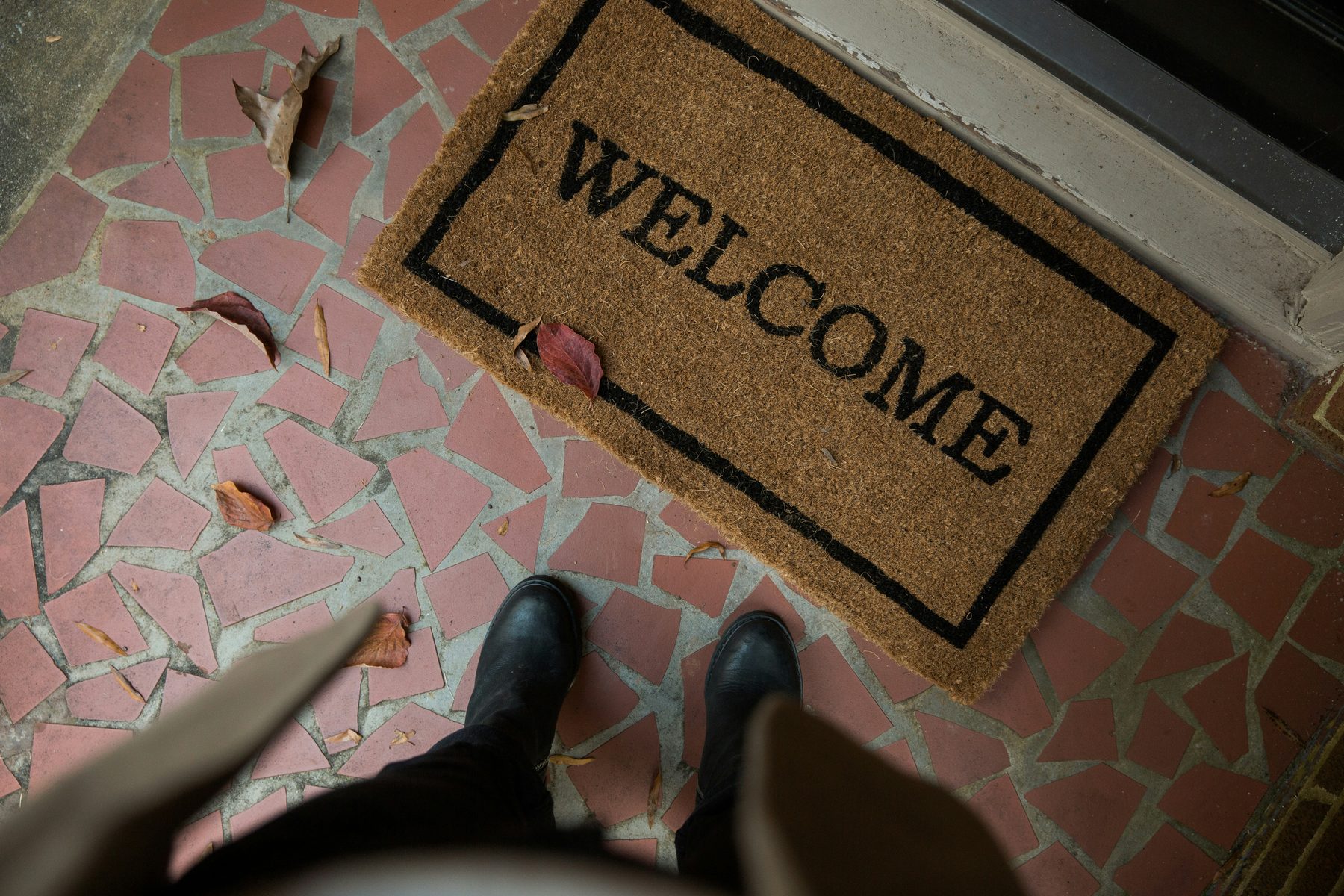 A welcome mat on a home's doorstep